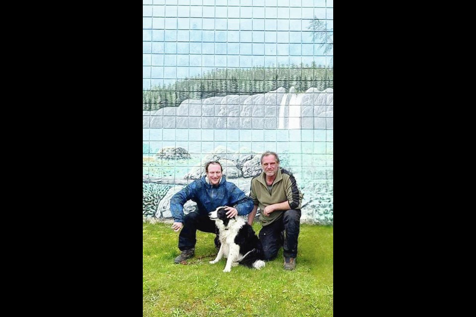 Carl Barnes, his dog Izzy and Izzy’s rescuer, Rory Ford of the Alberni Valley Rescue Squad. VIA ALBERNI VALLEY RESCUE SQUAD 