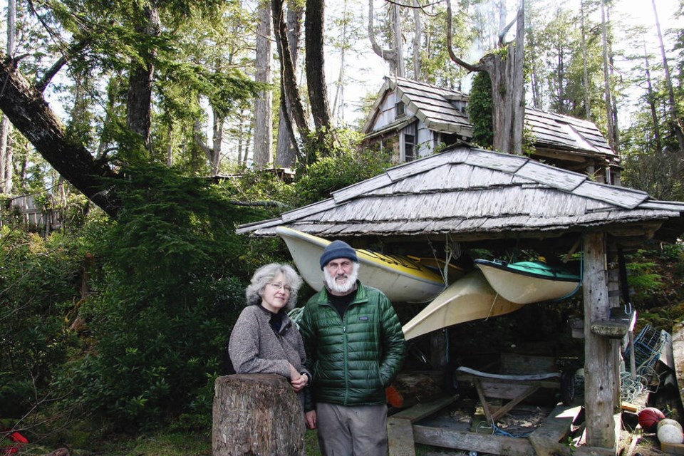 Bea and John Dowd on Vargas Island, where they lived for 10 years. After John stumbled across the cabin, he had little difficulty convincing Bea, who was ready for adventure, he writes. “Our kids were grown, doing their own thing. We’d travelled all we wanted. And from our fifteen years in a log cabin on Hollyburn Mountain above Vancouver, we already knew a thing or two about living off-grid.” COURTESY JOHN AND BEA DOWD 