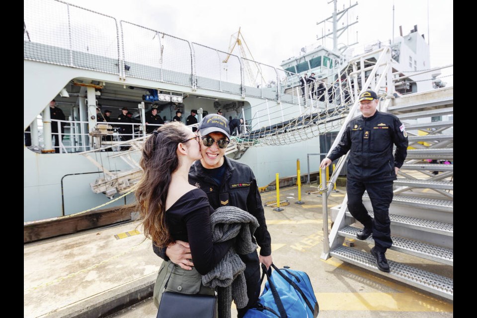 Sailor first class Daniel Tao and Jenna Mutter were the first-kiss contest winners as HMCS Max Bernays arrived in Esquimalt Harbour to join Canada’s Pacific Fleet on Monday. DARREN STONE, TIMES COLONIST 