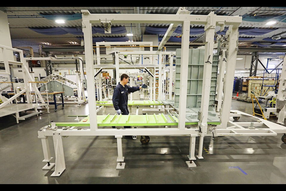 Kyle Kim works on a hull bulkhead at the De Havilland Canada facility in North Saanich that is manufacturing parts for the twin-engine DHC‑515 Firefighter aircraft. Final assembly of planes will be in Alberta. ADRIAN LAM, TIMES COLONIST 