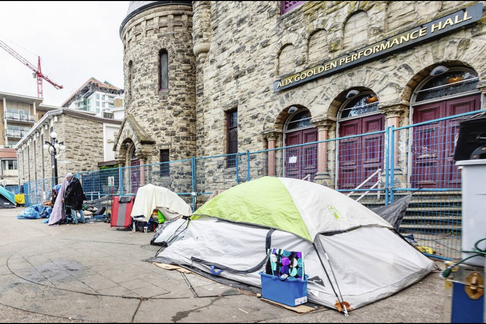 Tents and fencing in front of Alix Goolden Performance Hall’s Pandora Avenue entrance in September 2023. DARREN STONE, TIMES COLONIST 