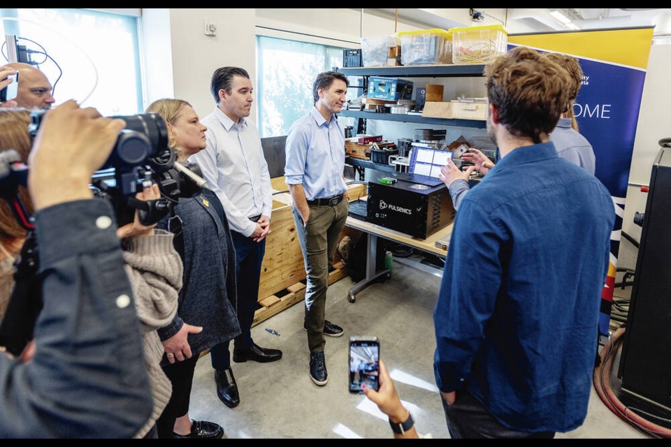 Prime Minister Justin Trudeau talks to UVic engineering students CanAssist wing of the CARSA building. DARREN STONE, TIMES COLONIST 