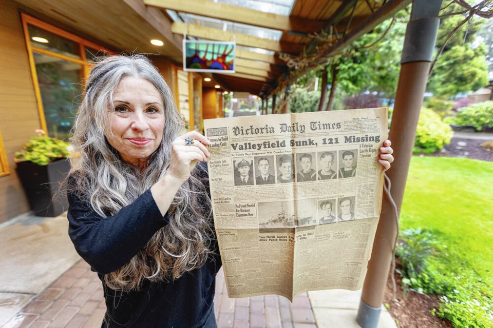Kathleen Hammick with a page from the Victoria Daily Times from May 15, 1944, a week after her father, Laurence Hammick, survived the sinking of the HMCS Valleyfield in the North Atlantic. DARREN STONE, TIMES COLONIST 