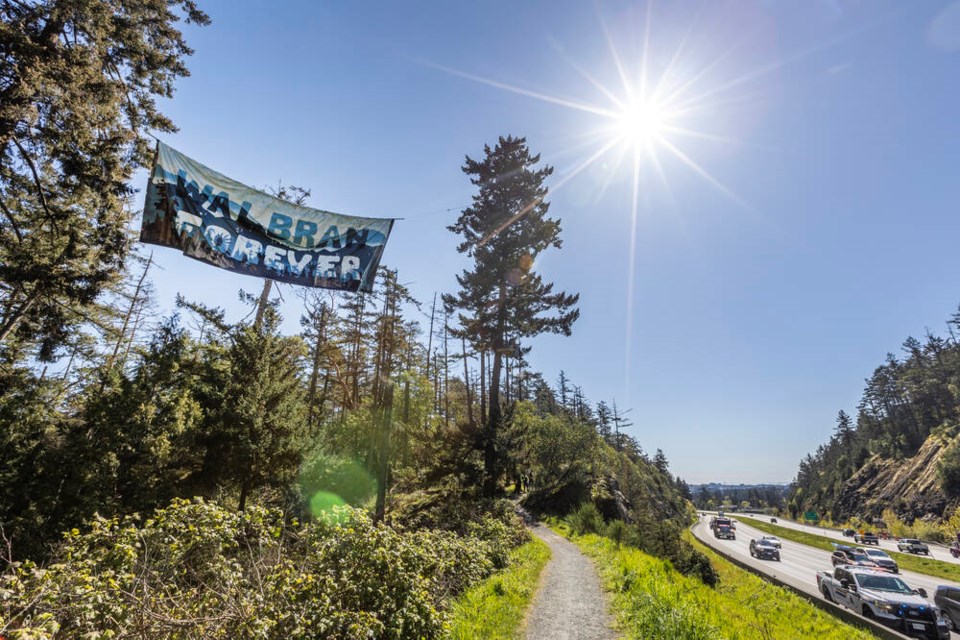 A Walbran Forever banner hangs by the Trans-Canada Highway near Thetis Lake on Thursday. DARREN STONE, TIMES COLONIST 