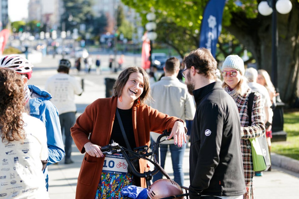 Grace Lore, MLA for Victoria Beacon-Hill, raced to the legislature by bike Wednesday morning as part of Capital Bike’s commuter challenge, which pits cyclists against motorists. Lore won her race against Victoria Mayor Marianne Alto. JAY WALLACE 
