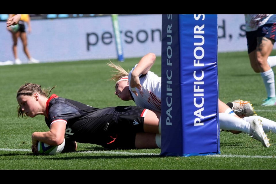 Canada’s Sophie de Goede scores a try against the United States during the second half of a Pacific Four Series women’s rugby match, Sunday, April 28, 2024, in Carson, Calif. THE CANADIAN PRESS/AP-Marcio Jose Sanchez 