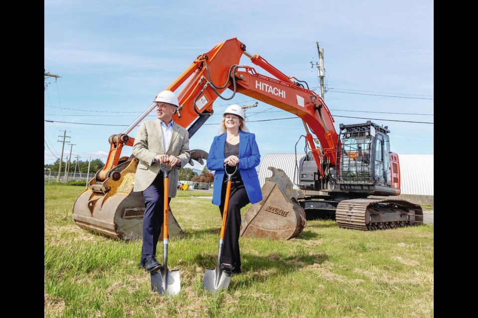 Ray Bohn, president and CEO of NAV Canada, and Elizabeth Brown, president and CEO of Victoria Airport Authority, at a groundbreaking ceremony Tuesday for the new tower at Victoria International Airport. DARREN STONE, TIMES COLONIST 