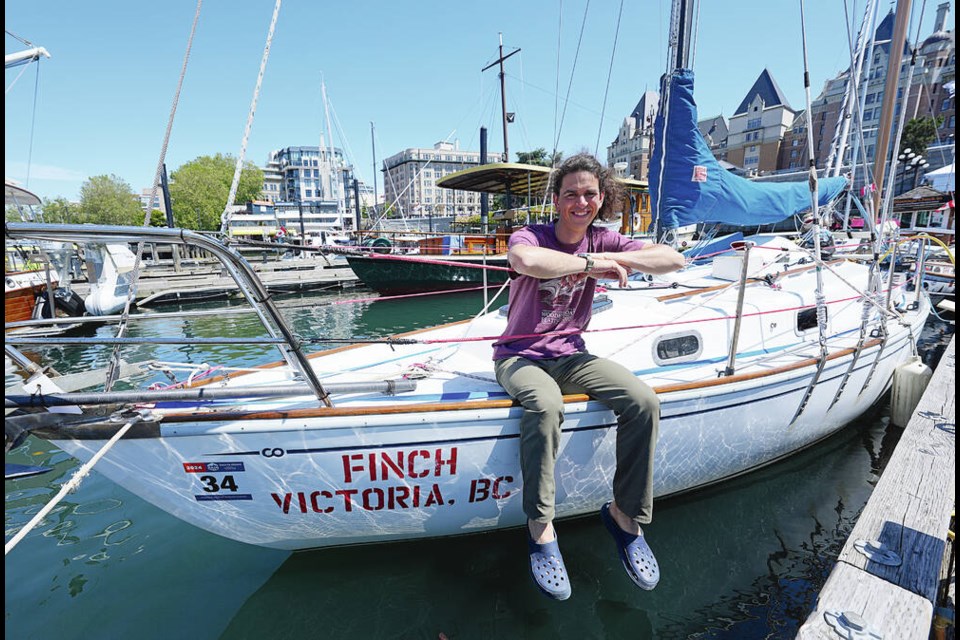 Liam Pareis on his sailboat in the Inner Harbour, after making it through the first leg of the Race 2 Alaska journey from Port Townsend to Victoria on Sunday. ADRIAN LAM, TIMES COLONIST 