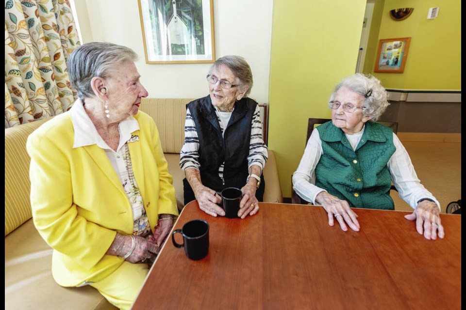 From left, Veronica Bennett-Butcher, Pam Belanger and Iona Kennedy at Veterans Memorial Lodge-­Broadmead Care this week. DARREN STONE, TIMES COLONIST 