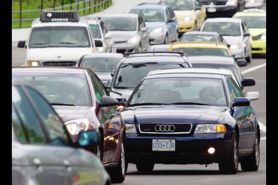 Motorists merge from four lanes into one as they enter the Lions Gate Bridge in Vancouver. Merging is one of the most challenging skills a driver can master, writes John Ducker.  THE CANADIAN PRESS
