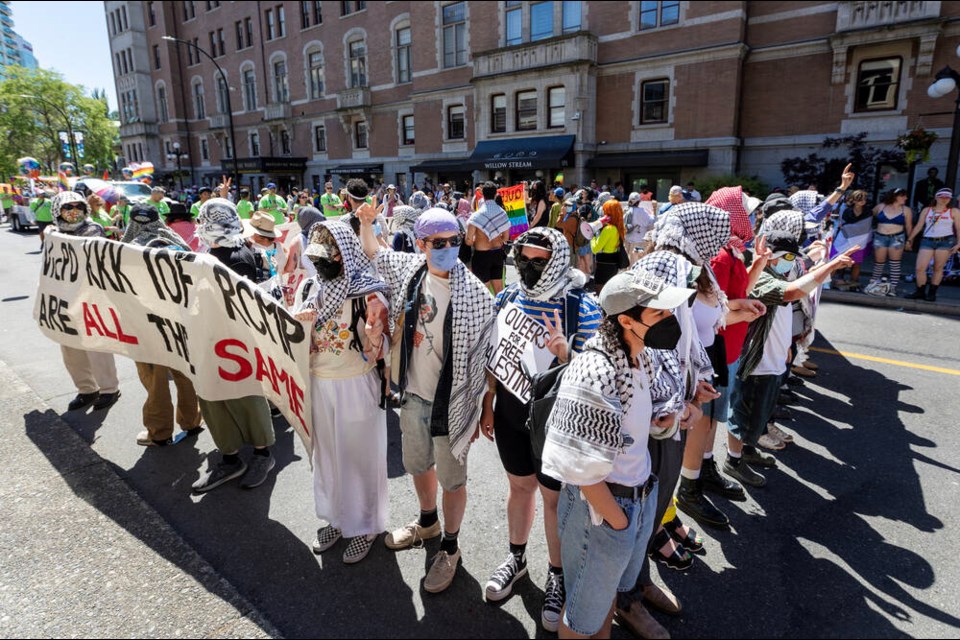 Pro-Palestinian protesters shut down the Victoria Pride Parade on Humboldt Street in Victoria, on Sunday. DARREN STONE, TIMES COLONIST July 7, 2024 