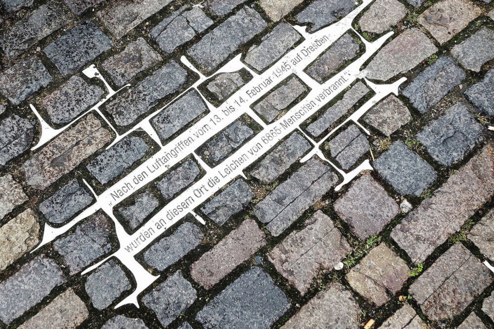 Reminders of the Dresden bombing permeate a visit, from reconstructed buildings to the very ground you walk on. RICK STEVES