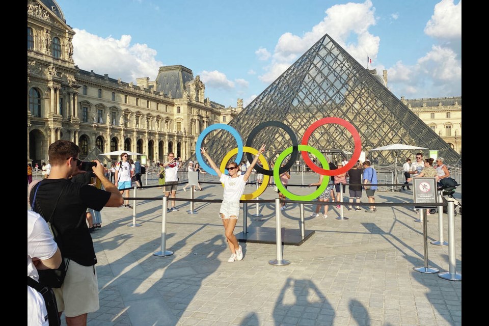 2024 Paris Summer Olympics. People lined up to get their pictures taken with the Olympics rings in front of the Louvre. TIMES COLONIST 