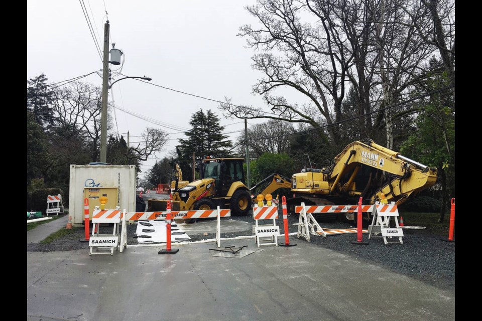 Construction vehicles parked in the 1100-block of Tattersall Drive on Sunday. TIMES COLONIST 