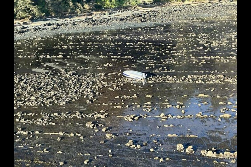 The 15-foot pleasure craft was found near Koitlah Point, Washington. One body has been found, but two others remain missing. VIA U.S. COAST GUARD 