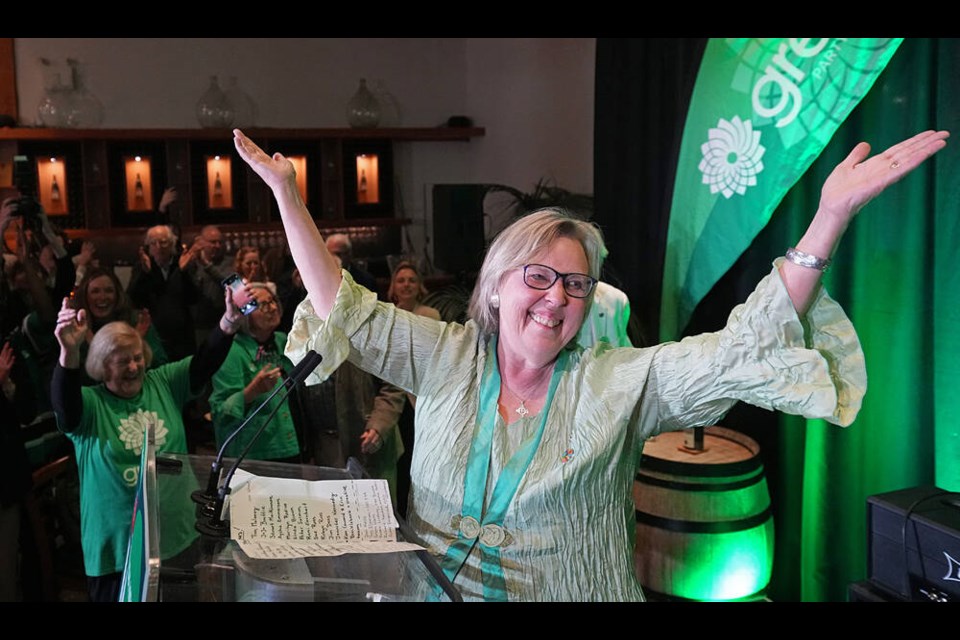 Green Party Leader Elizabeth May celebrates winning back her seat in Saanich-Gulf Islands at an election night watch party at Church & State Winery on Monday. ADRIAN LAM, TIMES COLONIST 