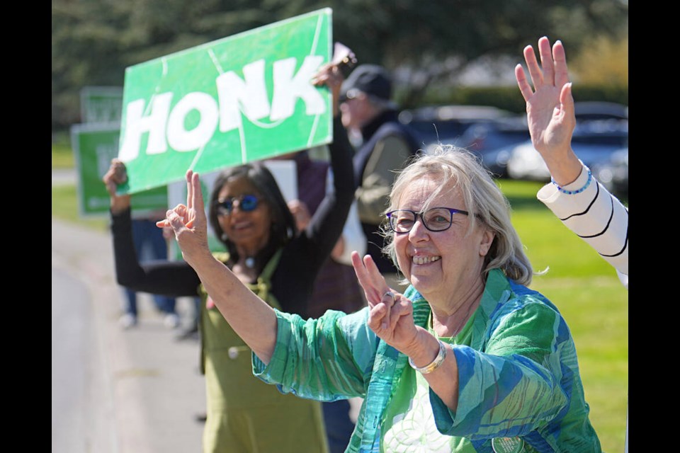 Green Party Leader Elizabeth May campaigns in Saanich. Despite predictions she might lose her seat, she put faith in the constituents who hugged her on the doorstep and waved, honked or hollered in support when she was out campaigning. ADRIAN LAM, TIMES COLONIST 