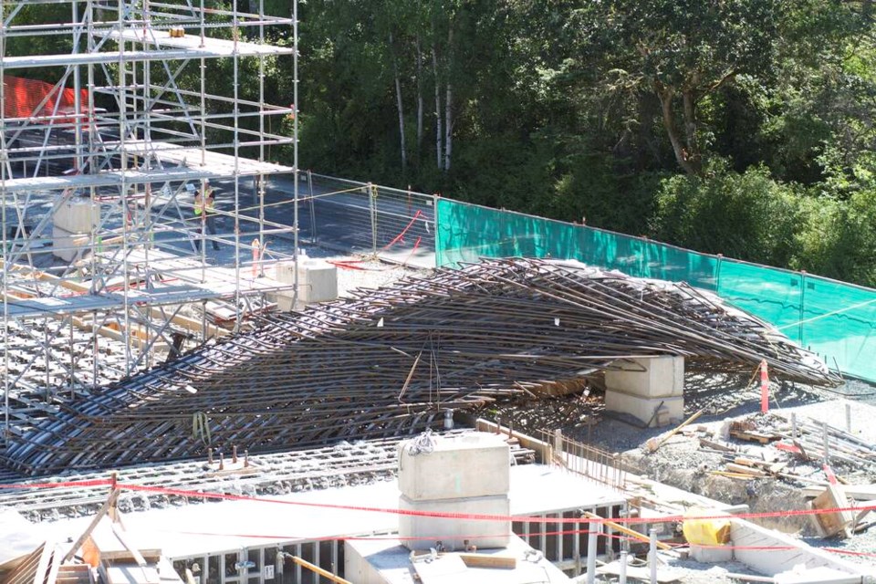 A mass of rebar and cables toppled over at a construction site at the University of Victoria on Sunday. MICHAEL JOHN LO, TIMES COLONIST 