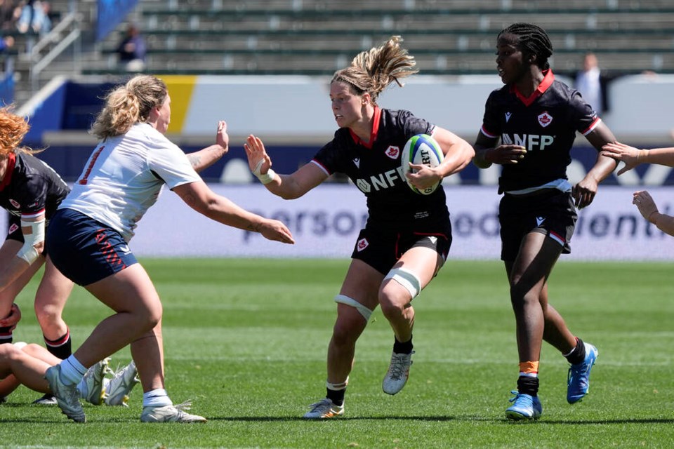 Victoria’s Sophie de Goede carries the ball against the United States during last year’s Pacific Four Series rugby match in California. De Goede is set to captain Canada for a series of games in South Africa. MARCIO JOSE SANCHEZ, THE ASSOCIATED PRESS
