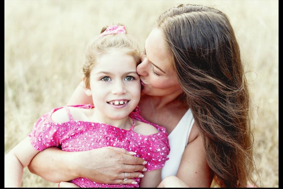 Jori Fales with daughter Charleigh Pollock, 9, who has a rare neurodegenerative condition known as Batten disease. VIA JORI FALES  
