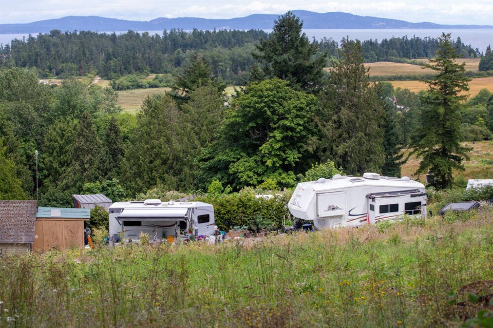 A view of the property at 5895 Old East Rd. Bylaw officers showed the court online ads for the sale of patio furniture with a photo that matched a “tarped off area containing a large amount of patio furniture,” and an online ad advertising “indoor parking” for boats, trailers and vehicles, next to a photo of the covered ring. DARREN STONE, TIMES COLONIST