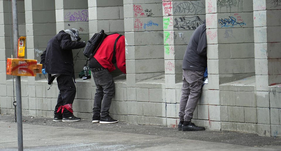 A few individuals use drugs hiding from the public view along Pandora Street. City councillor Marg Gardiner writes that Victoria’s blueprint for making the city “a livable, safe, and welcoming community” fails because it misses one clear truth: “the disorder on our streets is the result of the city’s failure to come to grips with illegal drug use.” ADRIAN LAM, TIMES COLONIST