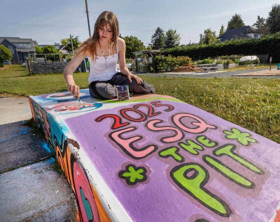 Astrid Defbudis, a Grade 11 student at Esquimalt High School, paints in “The Pit” in Anderson Park. The skateboard and youth gathering area of the park is being beautified by students. DARREN STONE, TIMES COLONIST