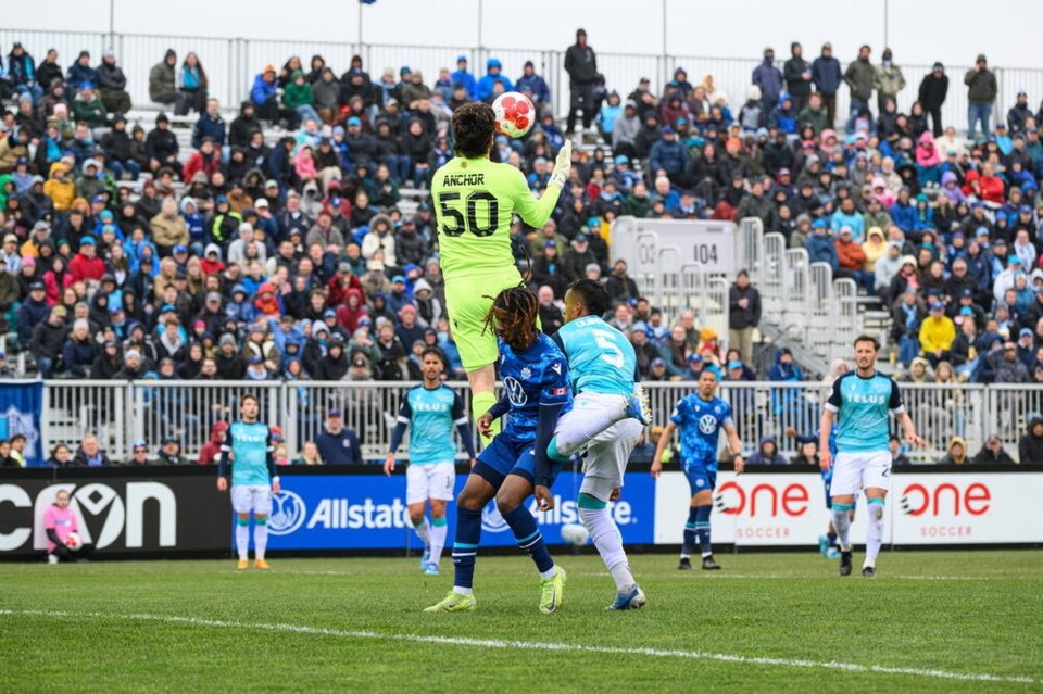 Pacific FC goalkeeper Max Anchor collects a cross during the game against HFX Wanderers in Halifax in April. HFX won 3-1. VIA PACIFIC FC