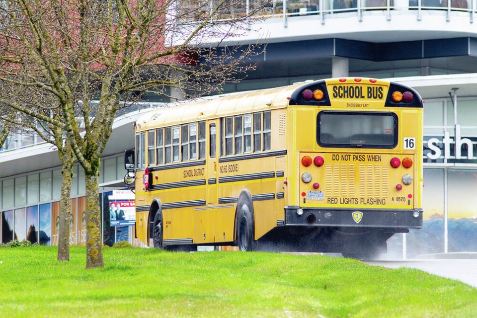 A Sooke School District school bus. Last year’s budget shortfall led to the reinstatement of school bus fees. DARREN STONE, TIMES COLONIST