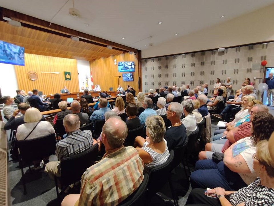 Saanich council meeting on July 7, at which the Quadra-McKenzie plan was the subject of heated discussion. MICHAEL JOHN LO, TIMES COLONIST