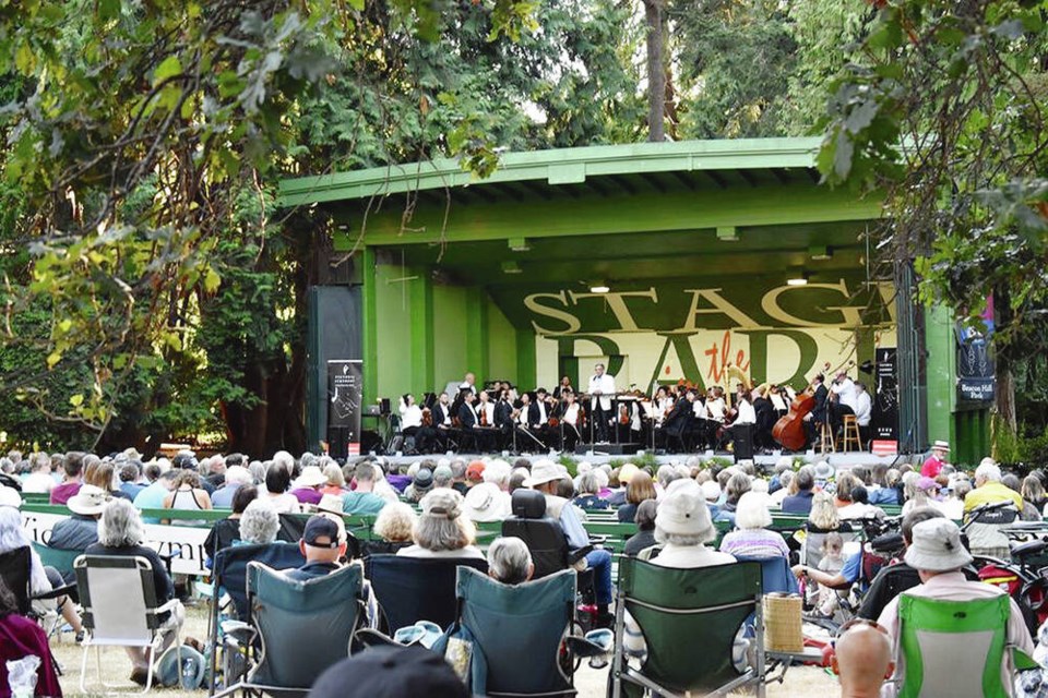 An audience watches a performance by the Victoria Symphony and Pacific Opera Victoria during Open Air  A Summer Festival of Music at the Cameron Bandshell in Victoria’s Beacon Hill Park. VIA PACIFIC OPERA VICTORIA