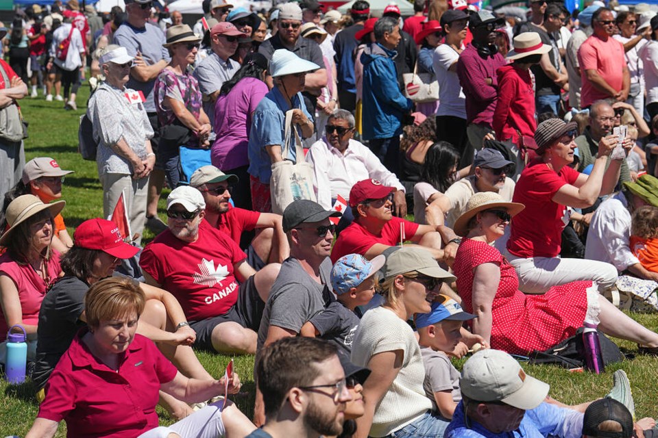 People gather on the legislature lawn for Canada Day festivities. ADRIAN LAM, TIMES COLONIST
