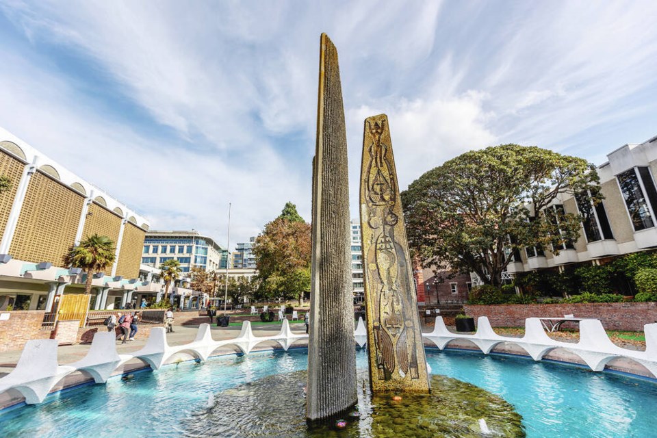 The Centennial Square fountain and its artwork in October 2023. Under an updated plan, the fountain will be dismantled, the ­artwork will be stored and a sequoia tree won’t be cut down. DARREN STONE, TIMES COLONIST