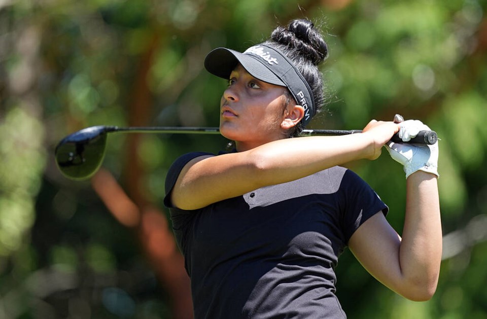 Zaya Baines of Langford keeps an eye on her drive during the B.C. Junior Girls Golf Championship at Gorge Vale Golf Club. 
ADRIAN LAM, TIMES COLONIST