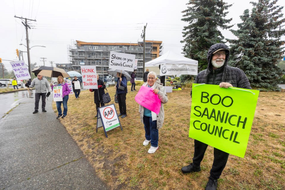 Save Our Saanich Neighbourhoods Society rally against the current Saanich Alternative Approval Process on June 21. DARREN STONE, TIMES COLONIST