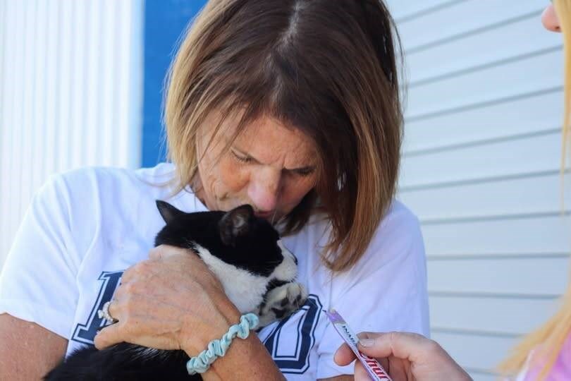Neelya Herbert is reunited with her lost cat Luigi at the Tswwassen ferry termninal. HALO’S PET RESCUE 