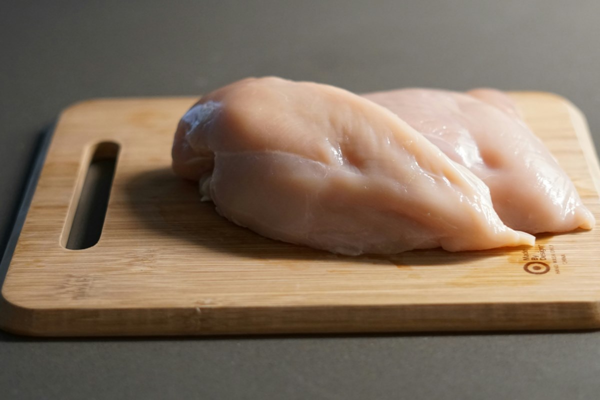 You might think you're being hygienic by washing that piece of chicken—but food safety authorities say you're doing more harm than good.