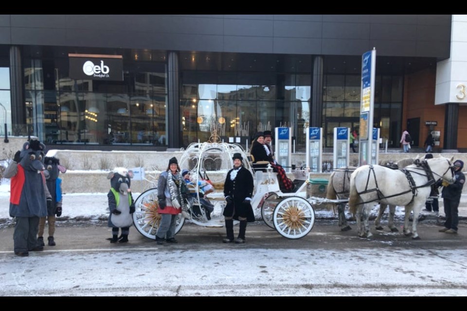 'Pa's Girls' hitched to the Cinderella Carriage on Main Street, Winnipeg.