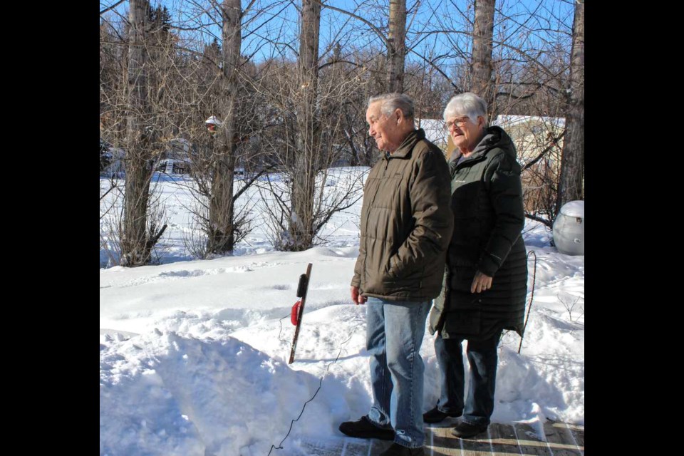 On Jan. 25, Bill and Louise Haskett are in their backyard where they are trying a deer repellant device from Manitoba Conservation. PHOTOS/ANNE DAVISON