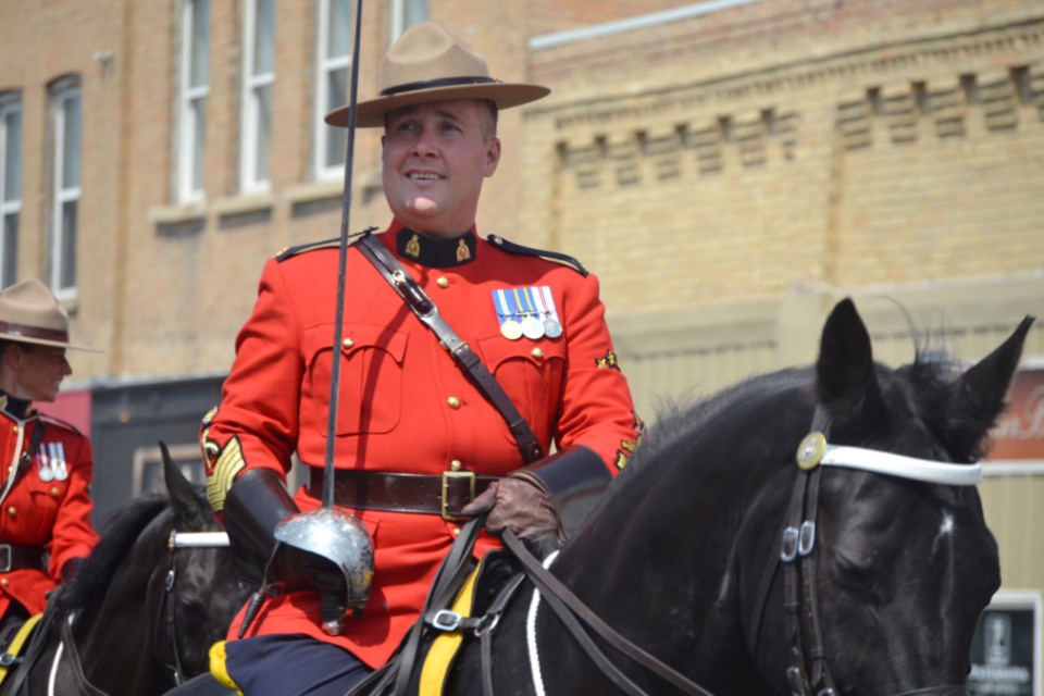 Sgt. Maj. Scott Williamson leading the RCMP Musical Ride on Virden's Seventh Avenue.