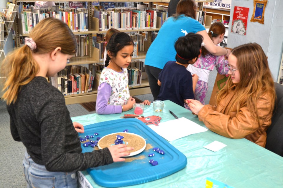 Games during Dr. Seuss's birthday celebration at the library.