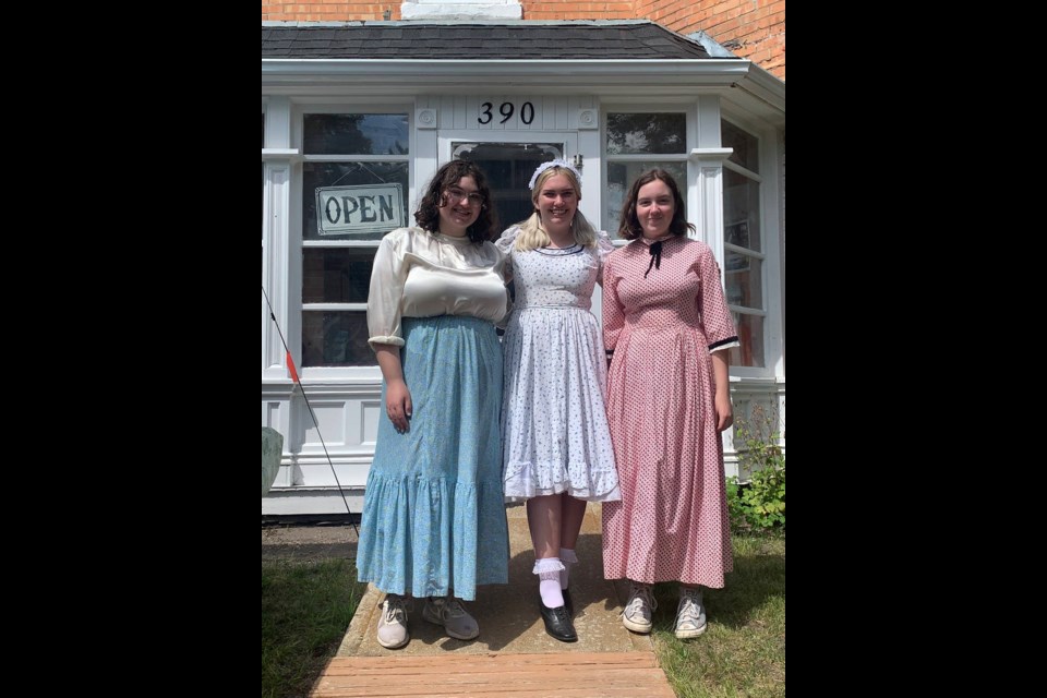 Madisen Naughton (l-r), Carlee Pearn, Kate Craig looking the part on Museum Day, Aug. 5. 