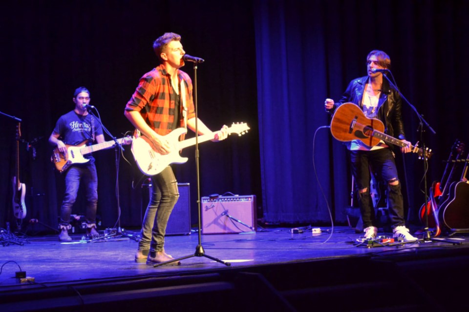 Petric, Manitoba's Country Group of the Year, brought their "Turn The Night Up" tour to the Virden Auditorium Theatre for an evening show on Oct. 22.  Performing are, left to right, Jordan Day, Tom Petric and Jason Petric.  