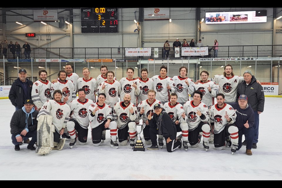 The Miniota-Elkhorn C-Hawks have won the THHL league trophy following their win over the Killarney Shamrocks on Saturday in Virden’s TOGP:  (rear l-r): Coach Keith Orr, Curtis Gardham, Kyle Lougheed, Brad Cole, Jason Bowles, Shawn Bowles, Jayce Soder, Taylor Sanheim, Josh Martin, Damon Bajus, Logan Brennand, Cody Rookes, Brad Bowles and Coach Garth Mitchell; (front l-r) Colin Paull , Cory Gardham, Dillin Stonehouse, Tanner Kyle, Dustin Fisher, Bray Rookes, Equipment Manager Jed Quoquat, Bryce Kyle, Stacy Lowes, Zeenan Zeimer, Ian Oliver; missing, Drayton Shiner. 