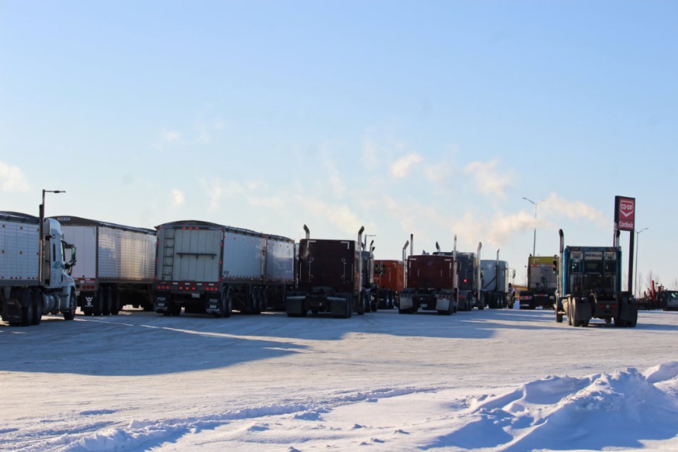 Trucks idle at Virden's co-op cardlock, Jan. 25, 2022, waiting for the convoy coming from the west. Virden Empire-Advance file.
