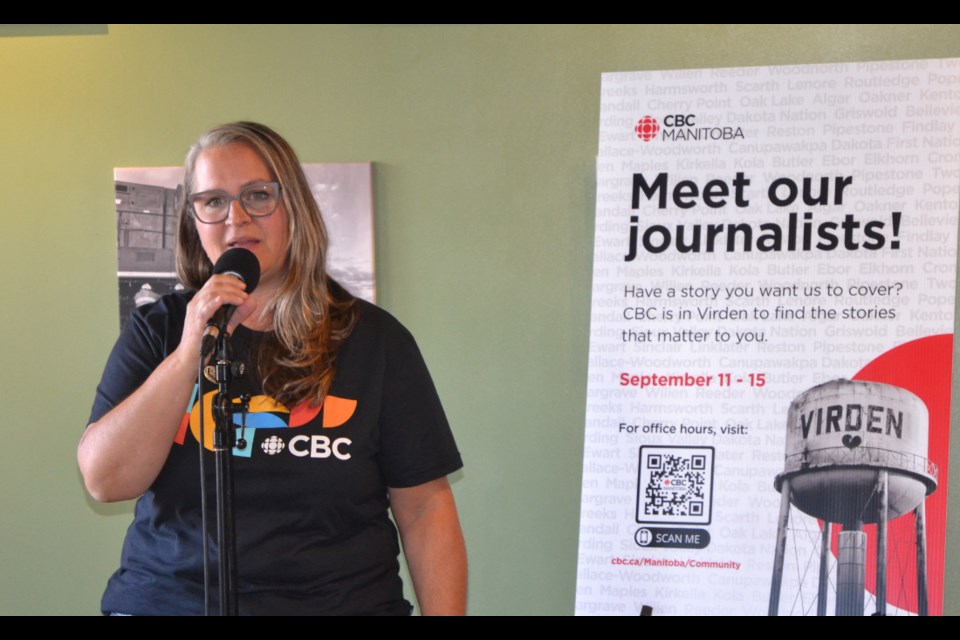 CBC Manitoba Information Radio Host Marcy Markusa introduces herself during a public Communities in Focus reception at MJ's Coffee Bar & Bistro on Sept. 13.