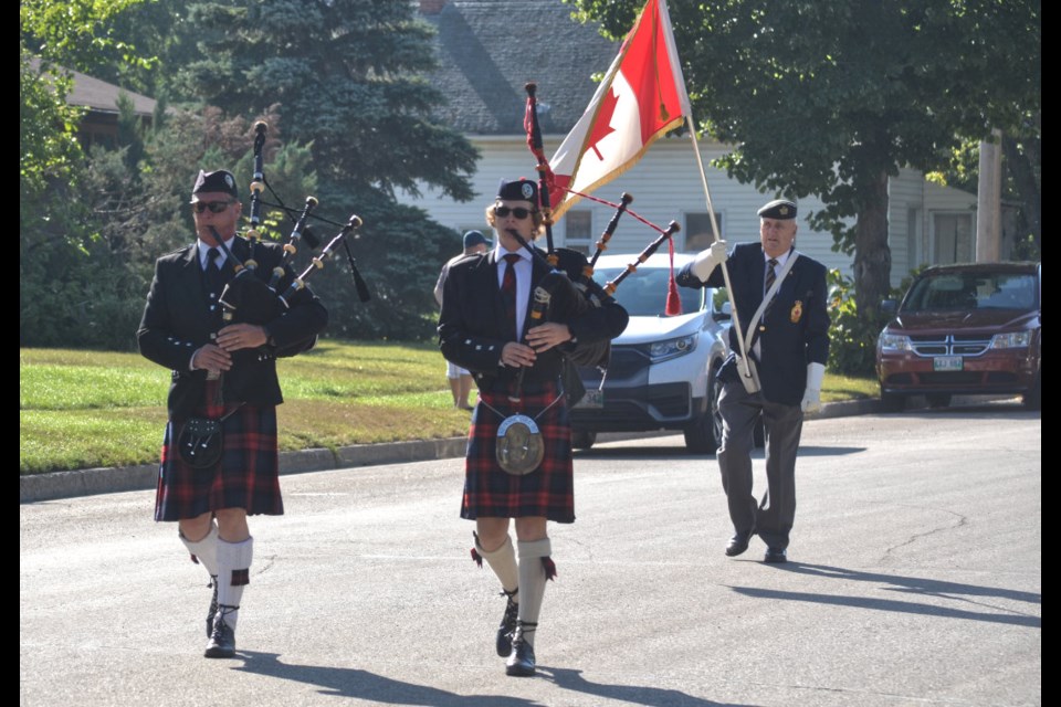 Leading the Royal Canadian Legion - Virden Branch No. 8 float are pipers David (l) and Declan Kyle of Brandon, along with flag bearer Kelvon Smith of Virden. 