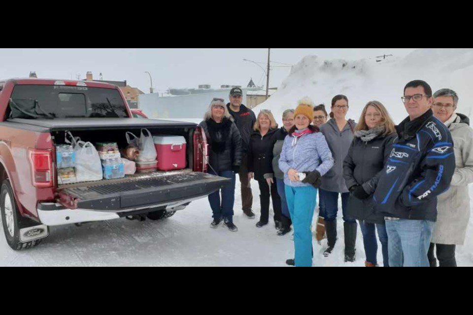 Food and monetary donations in support of the Freedom Convoy 2022 were collected at a drop-off point at the Red Apple parking lot  on Sunday, Jan. 23. 