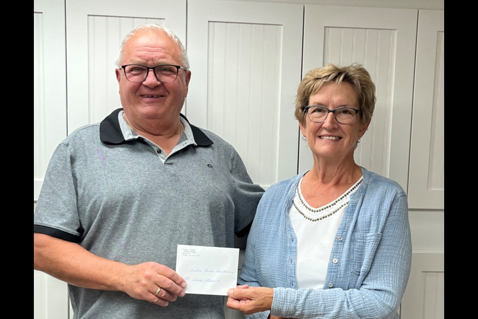 Home Hardware in Virden continues to be a big supporter of the Virden and District Health Auxiliary and the community it serves by donating the proceeds of its recent in-store raffle. Posing with Gwen Clarke of the Auxiliary is Joe Careme from Home Hardware. 