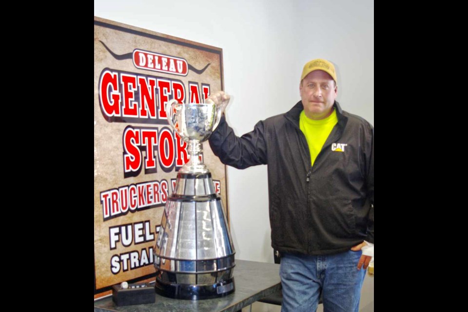 Scott Phillips, proprietor of Deleau General Store, with the Grey Cup, March 23.
